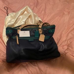 Like New: Leather Navy, Green and Silver metal